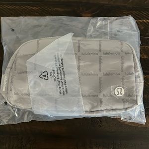 LULULEMON Everywhere Belt bag 1L, NWT. Wordmark Grid Print. 📝